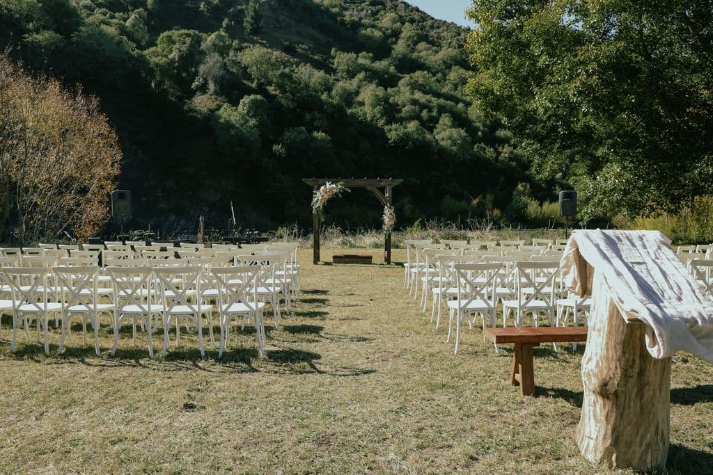 Idyllic farm wedding venue in Hawke’s Bay with rustic charm beside a flowing river.