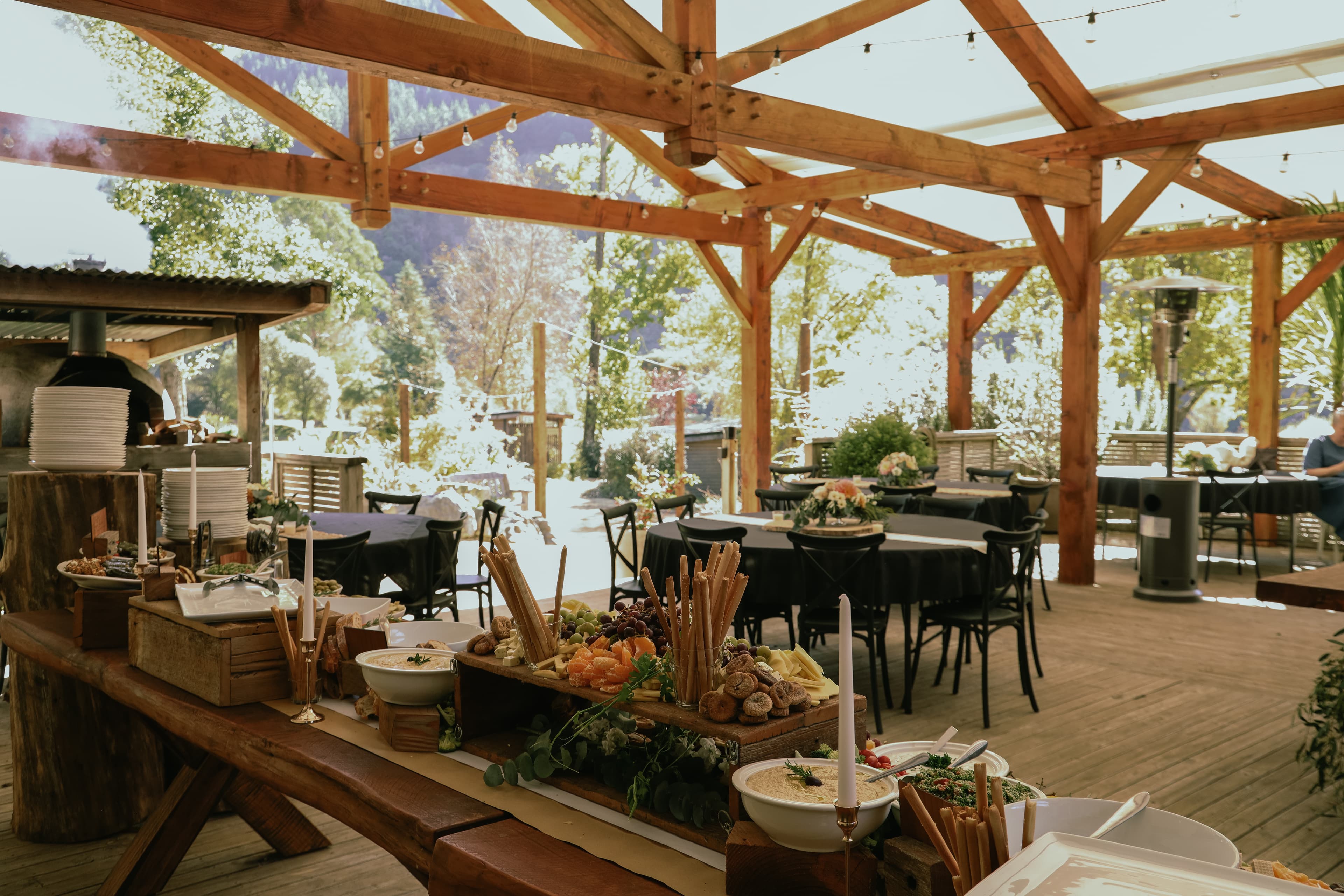 Rustic timber structures and wildflowers at a boutique Hawke’s Bay wedding venue.