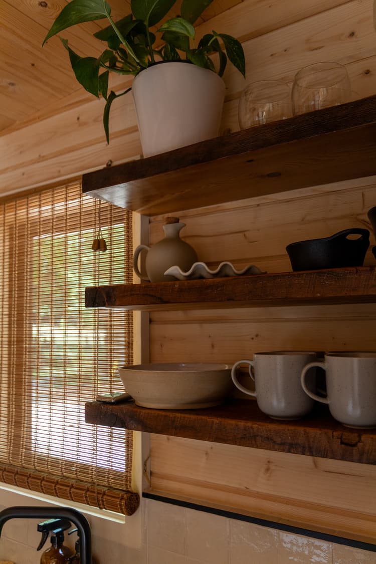 Thoughtfully decorated interior and kitchenette at the Mohaka River Farm resort in Hawke's Bay