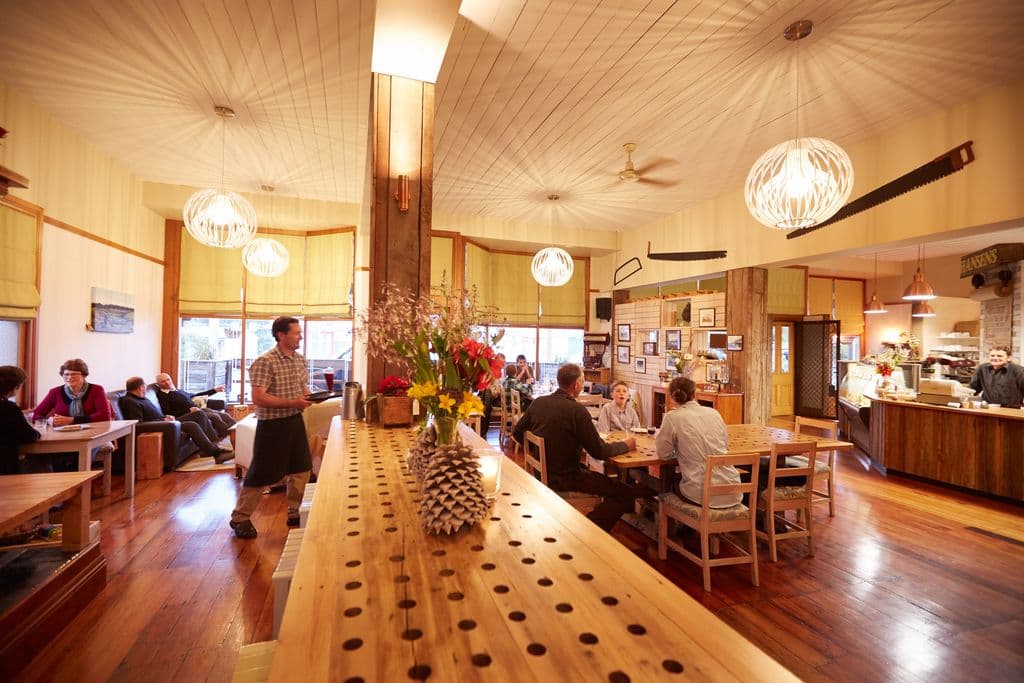 Group of Christian families working in their rural cafe after leaving city life to raise their children in the countryside.