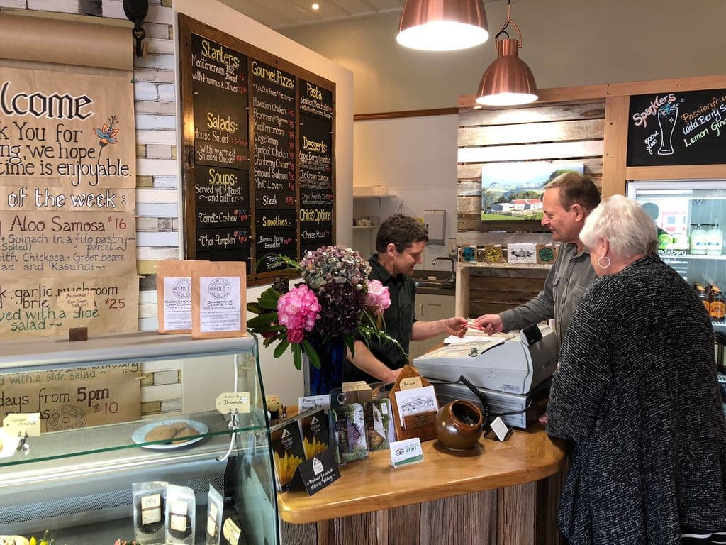 Several families who relocated from the city to the countryside, embracing rural community life focused on family and shared values in their Kimbolton cafe